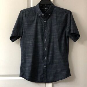 Man short sleeve navy blue button up shirt. Size medium.